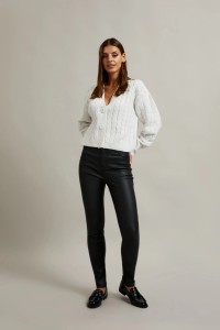 Woskowane spodnie rurki czarne