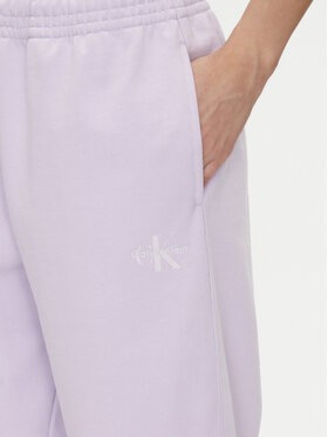 Calvin Klein Jeans Spodnie dresowe Monologo LV047B235G Fioletowy Regular Fit