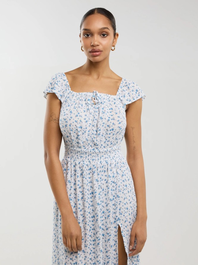 Sukienka damska midi z wiskozy z motywem kwiatowym biała Lopa 100