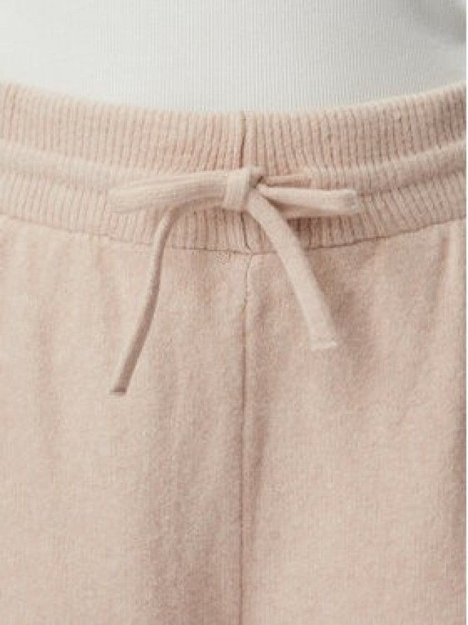 adidas Spodnie dresowe Essentials KR9180 Beżowy Loose Fit