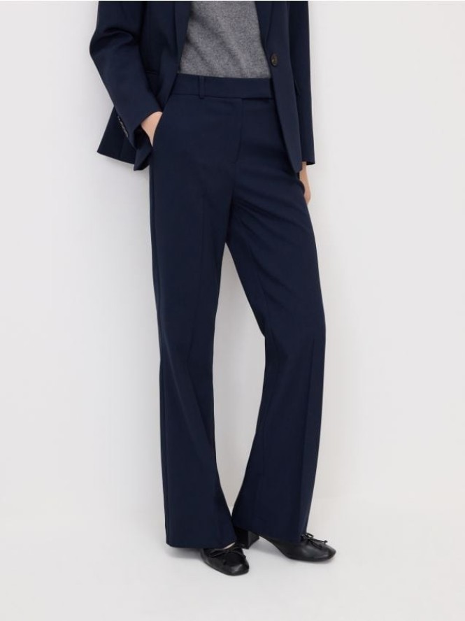 Spodnie flare z kantem - granatowy