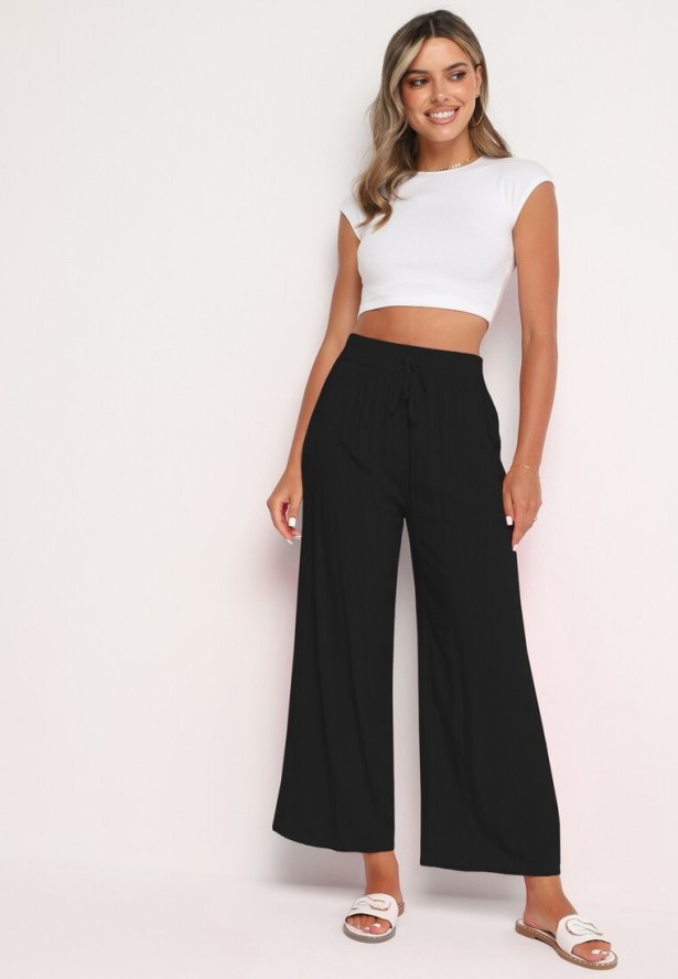 Czarne Bawełniane Szerokie Spodnie Alladynki z Wysokim Stanem i Gumką w Talii Risalles