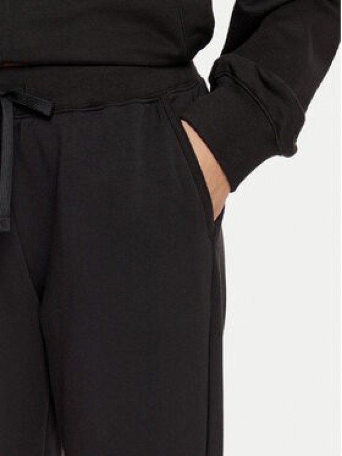 Champion Spodnie dresowe 117584 Czarny Slim Fit