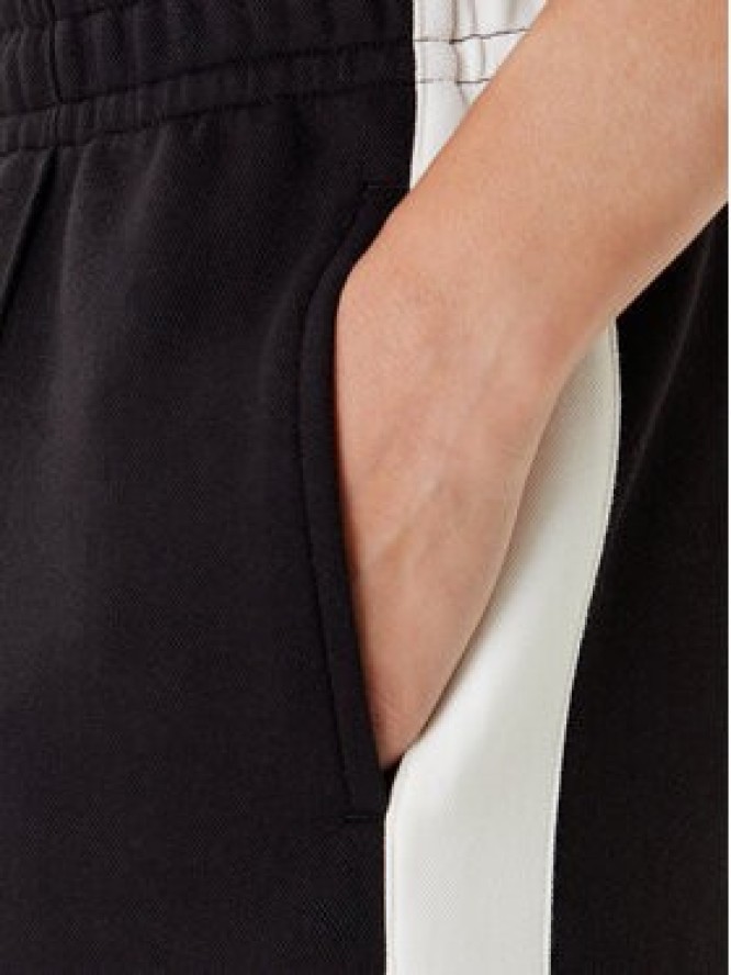 Karl Kani Spodnie dresowe PD00005427 Czarny Regular Fit