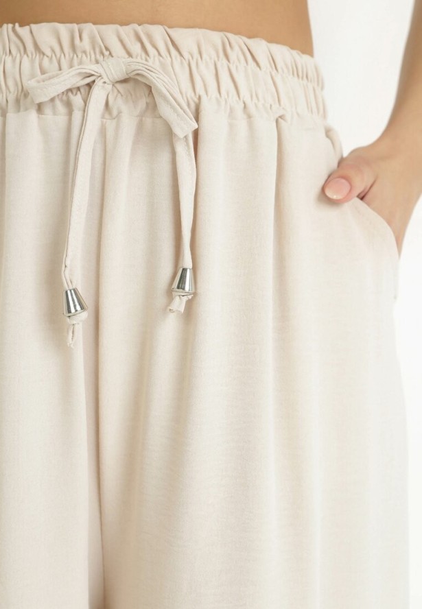 Jasnobeżowe Szerokie Spodnie z Gumką w Pasie Sliverta