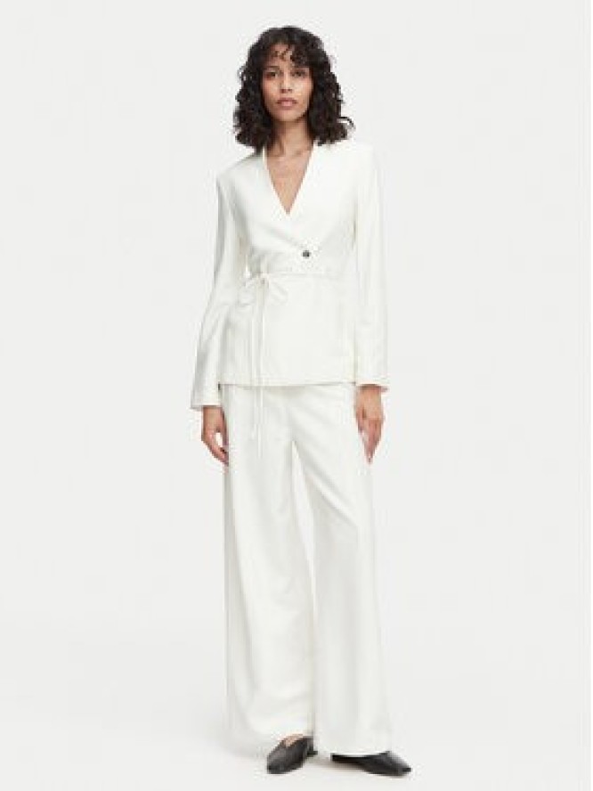 Calvin Klein Spodnie materiałowe LV044F651G Kremowy Straight Fit