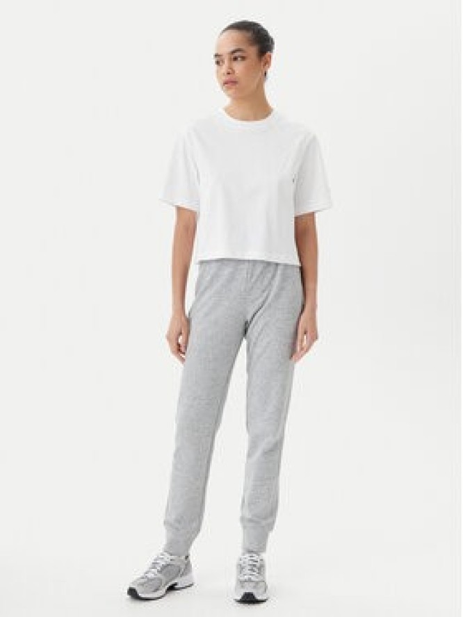 Champion Spodnie dresowe 118101 Szary Slim Fit