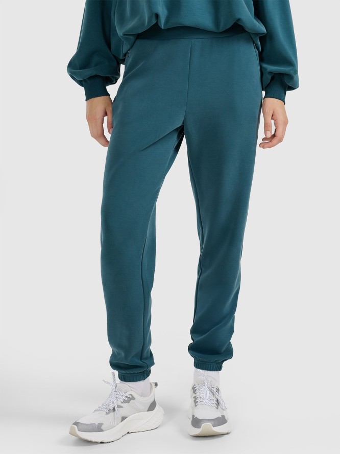 4F Spodnie dresowe joggery z modalem damskie - turkusowe XXL