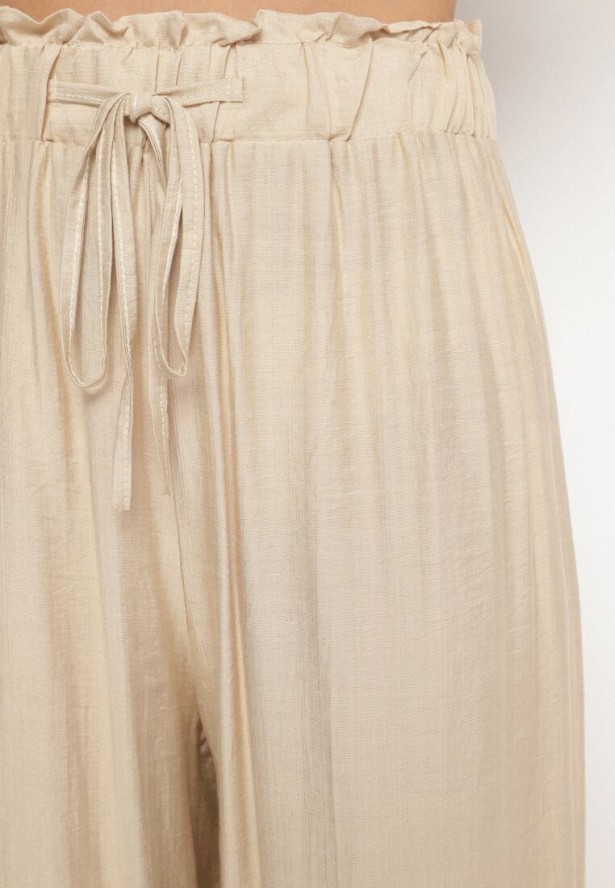Beżowe Szerokie Spodnie z Wysokim Stanem Ozdobione Wiązaniem Teliriela
