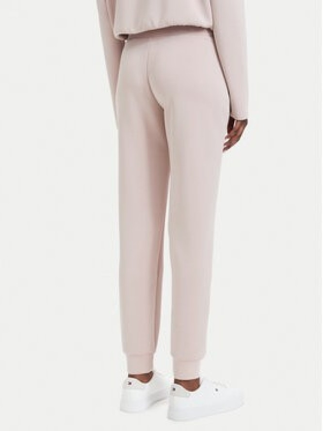 Guess Spodnie dresowe V4YB08 KCAY2 Różowy jasny Regular Fit