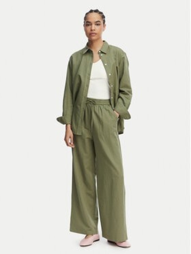 Tommy Jeans Spodnie materiałowe DW0DW22285 Zielony Loose Fit