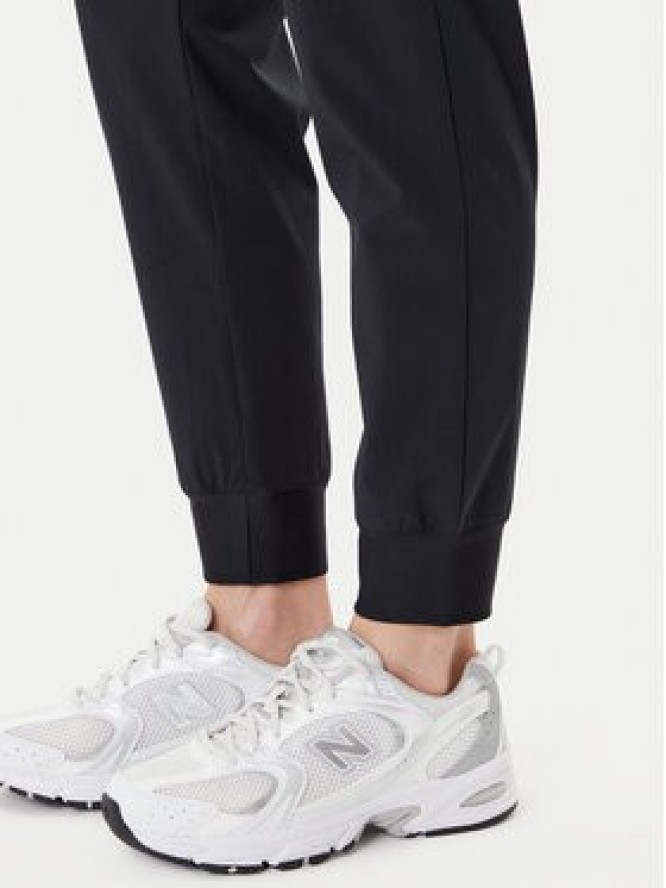 Under Armour Spodnie dresowe Armoursport High Rise Wvn Pnt 1382727-001 Czarny Loose Fit