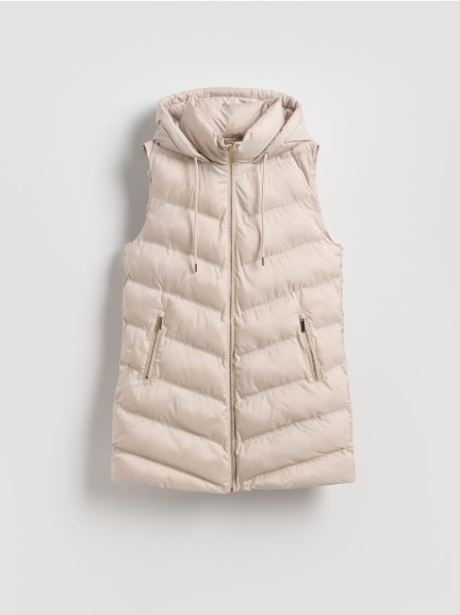 Pikowana kamizelka z kapturem - kremowy