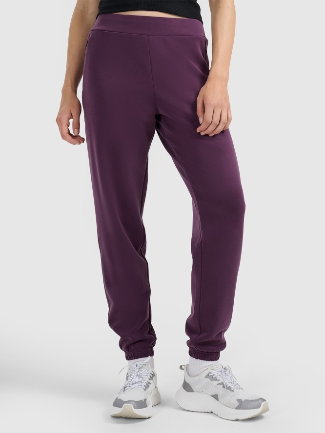 4F Spodnie dresowe joggery z modalem damskie - fioletowe XL