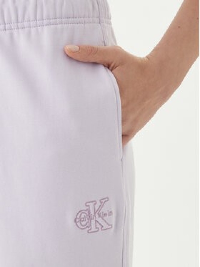 Calvin Klein Jeans Spodnie dresowe Embossed Monologo LV047F206G Różowy Regular Fit