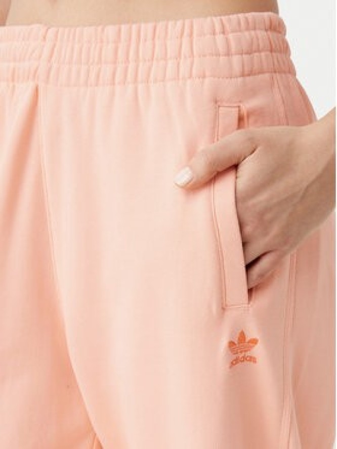 adidas Spodnie dresowe Essentials JD1525 Różowy Loose Fit