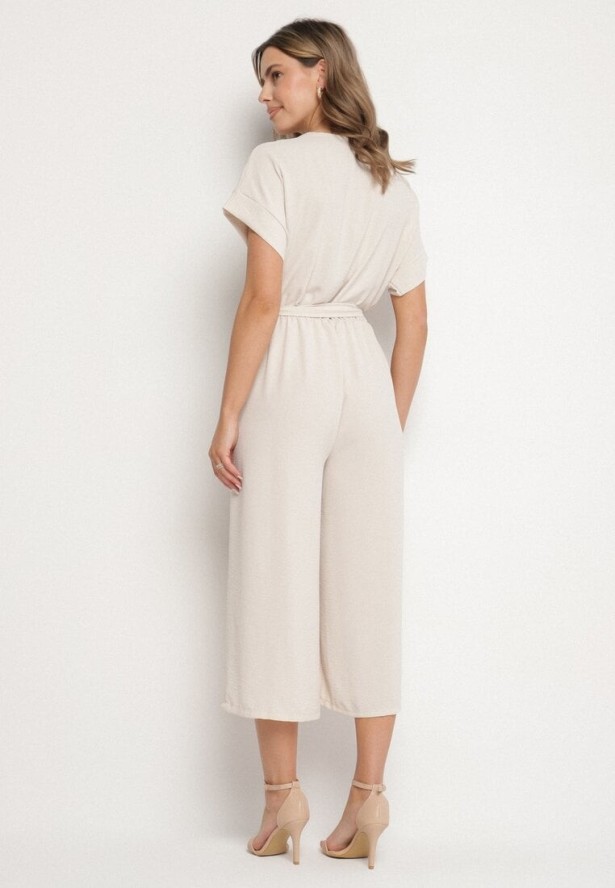 Beżowy Kombinezon o Kopertowym Kroju z Wiązanym Paskiem Tenirea