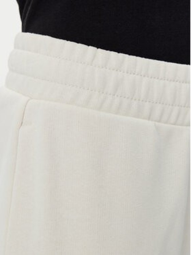 Puma Spodnie dresowe Ess Small No. 1 Logo 684979 Beżowy Straight Fit