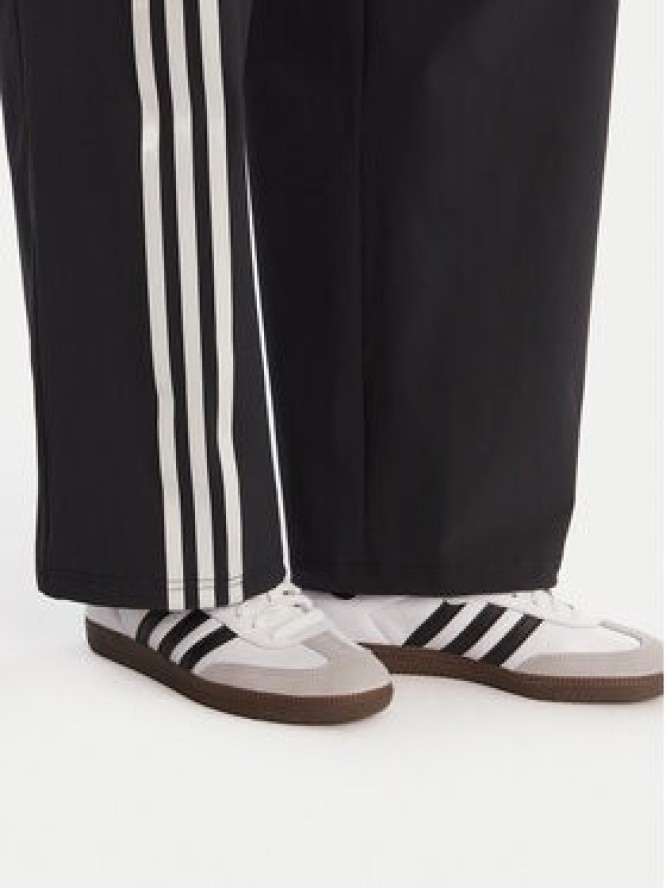 adidas Spodnie dresowe Ribbon Parachute JV9727 Czarny Loose Fit