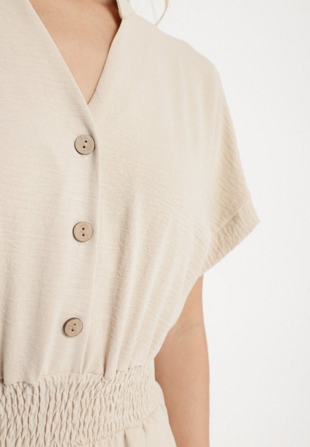 Beżowy Kombinezon z Wiskozy z Gumką w Talii i Dekoltem w Serek z Guzikami Nisella