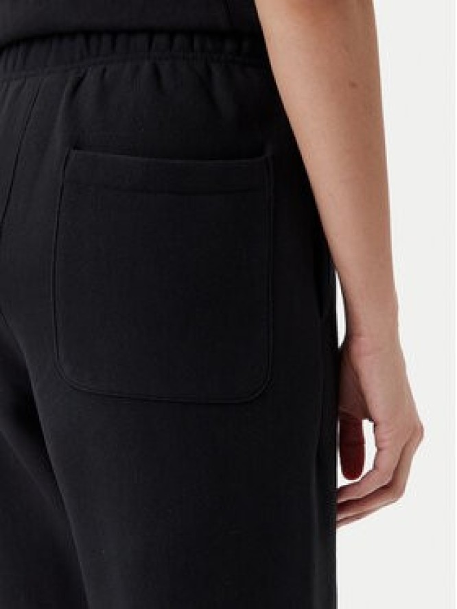 Champion Spodnie dresowe 117872 Czarny Slim Fit