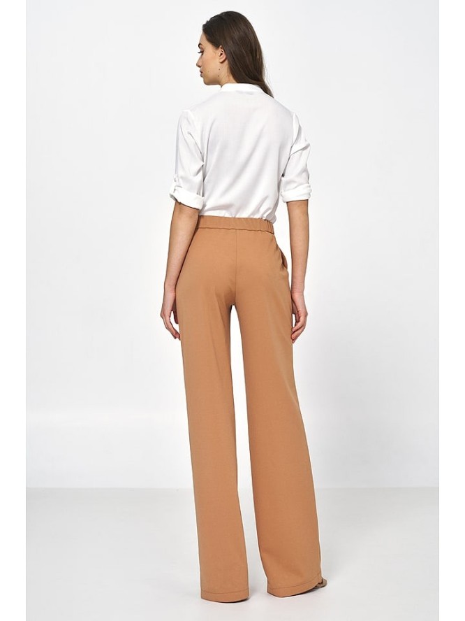 Nife Bluzka w kolorze kremowym rozmiar: 34