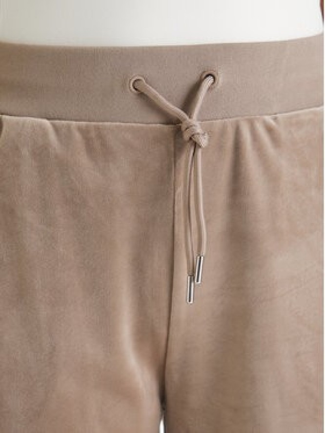 Guess Spodnie dresowe V3BB26 K0232 Beżowy Regular Fit