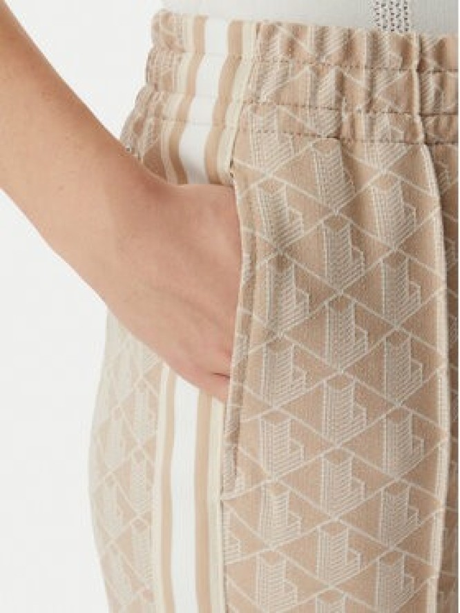 Lacoste Spodnie dresowe XF9313 Beżowy jasny Regular Fit