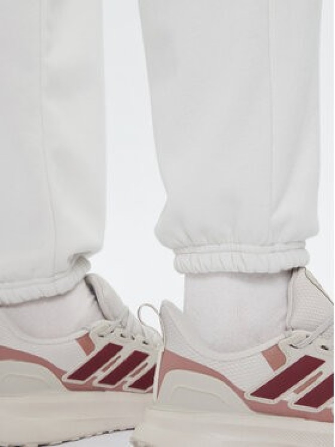 Under Armour Spodnie dresowe Ua Icon 6003676 Écru Loose Fit