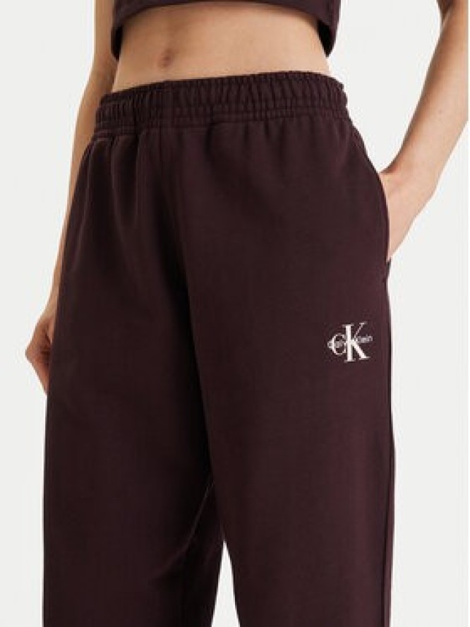 Calvin Klein Jeans Spodnie dresowe Monologo LV047B235G Brązowy Regular Fit