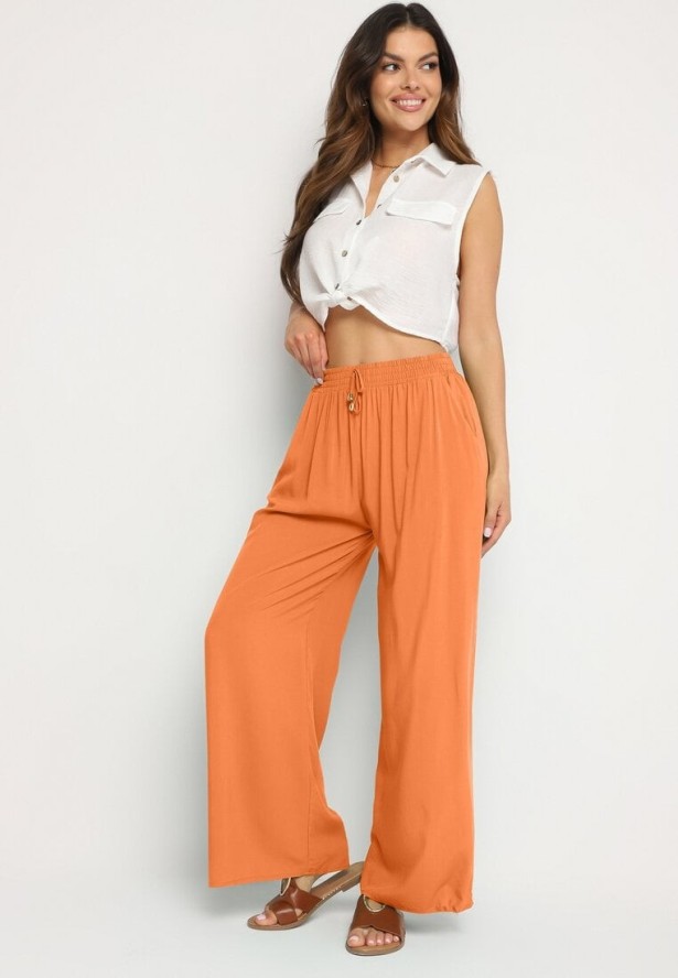 Pomarańczowe Gładkie Spodnie z Gumką w Pasie i Szerokimi Nogawkami Alathera