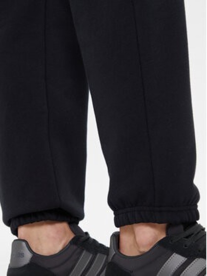 Under Armour Spodnie dresowe Ua Icon 6003676 Czarny Loose Fit