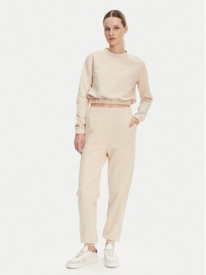 Calvin Klein Jeans Spodnie dresowe J20J225355 Beżowy Regular Fit