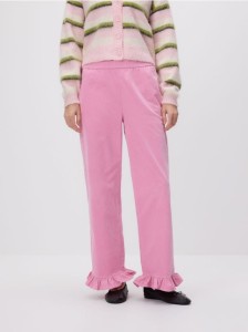 Spodnie z falbanką - pastelowy róż