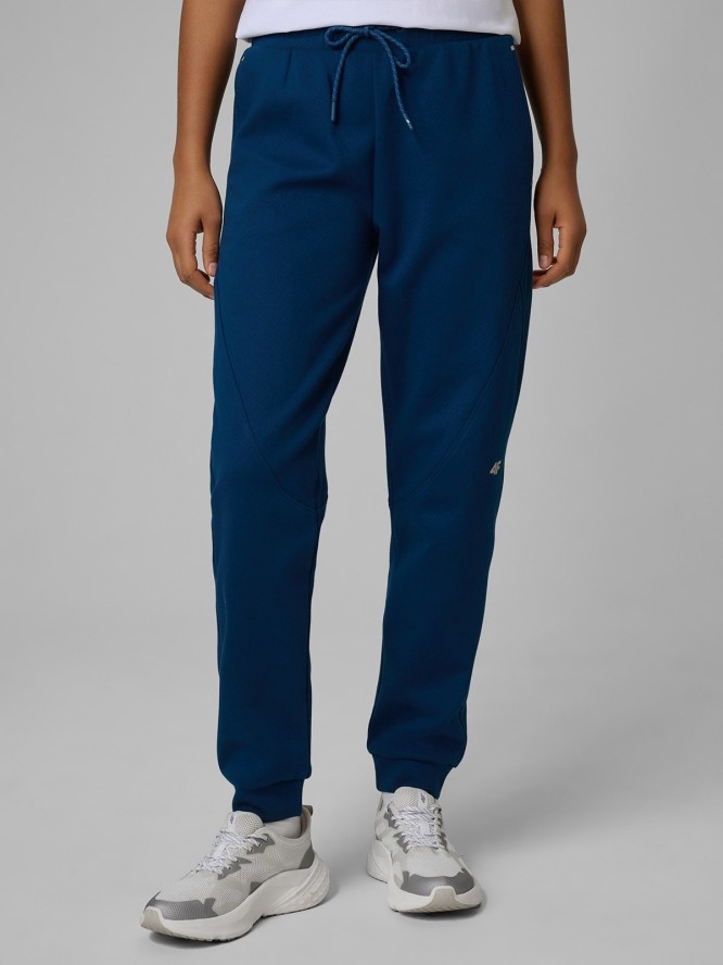 4F Spodnie dresowe joggery damskie - turkusowe S