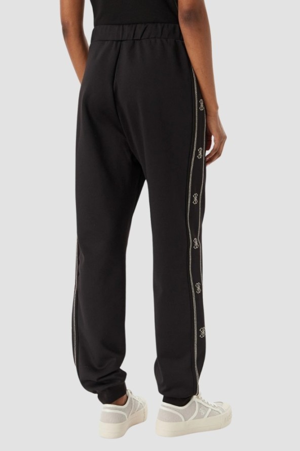 GUESS Czarne damskie spodnie dresowe z lampasami i cyrkoniami Octavia, Rozmiar XS