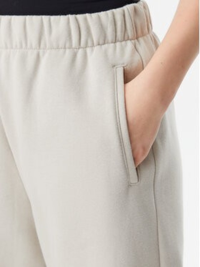 Gap Spodnie dresowe 765568-03 Beżowy Relaxed Fit