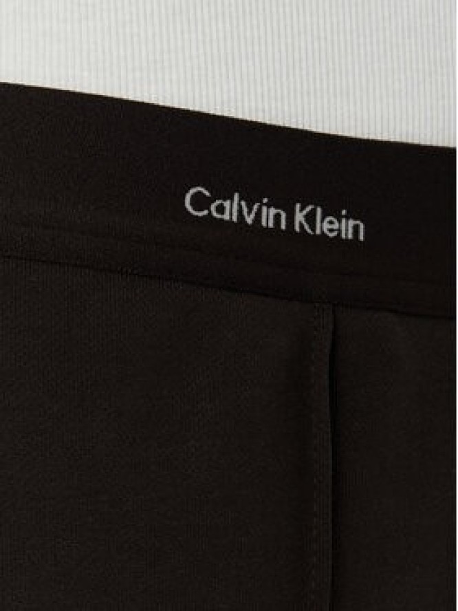 Calvin Klein Jeans Spodnie dresowe LV047G253G Brązowy ciemny Relaxed Fit