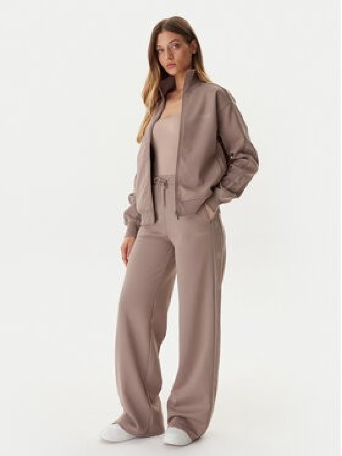 Guess Spodnie dresowe V5BB12 KCX22 Beżowy Wide Leg