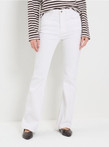 Jeansy flare mid waist - biały
