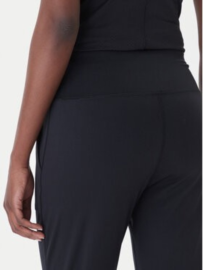 Under Armour Spodnie dresowe Motion 1375077 Czarny Slim Fit