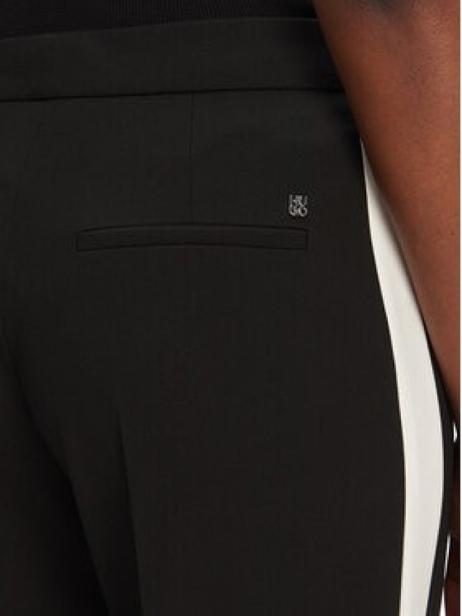 HUGO Spodnie materiałowe Hizana 50544753 Czarny Flare Fit