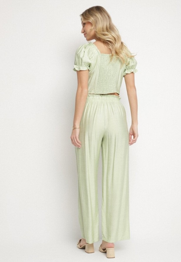 Jasnozielony Wiskozowy Komplet Spodnie o Szerokim Kroju i Top Heltebia