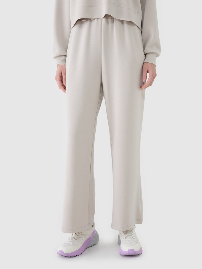 4F Spodnie dresowe z modalem z szerokimi nogawkami damskie - beżowe M