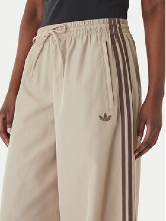 adidas Spodnie dresowe Firebird Adilenium KD6300 Beżowy Regular Fit