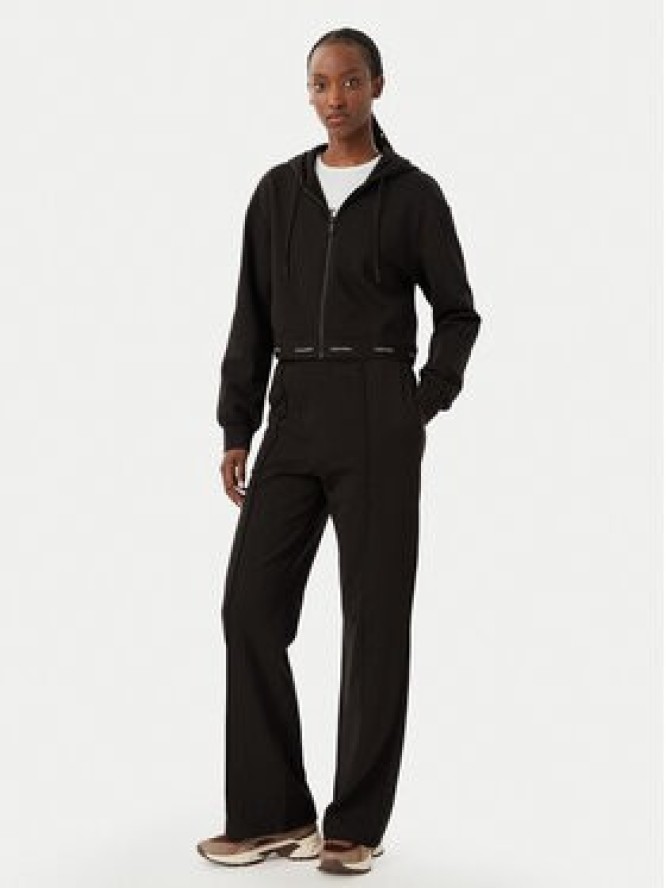 Calvin Klein Jeans Spodnie dresowe LV047G253G Brązowy ciemny Relaxed Fit