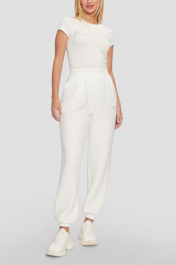 GUESS Dresowe damskie spodnie w kolorze ecru Cecilia Scuba, Rozmiar S