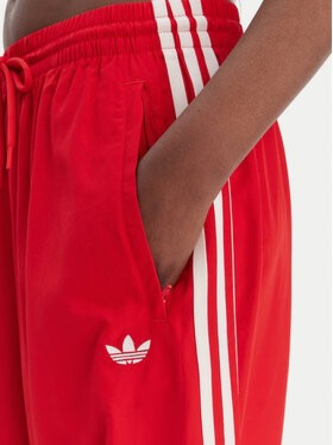 adidas Spodnie dresowe Firebird Adilenium KD6299 Czerwony Regular Fit