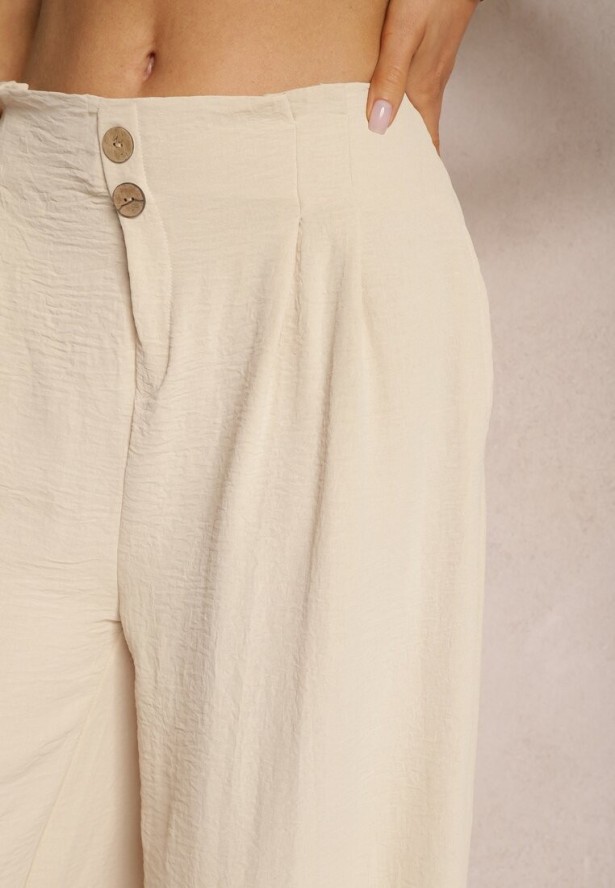 Beżowe Spodnie w Stylu Alladynek High Waist Wykończone Gumką w Pasie Riselma