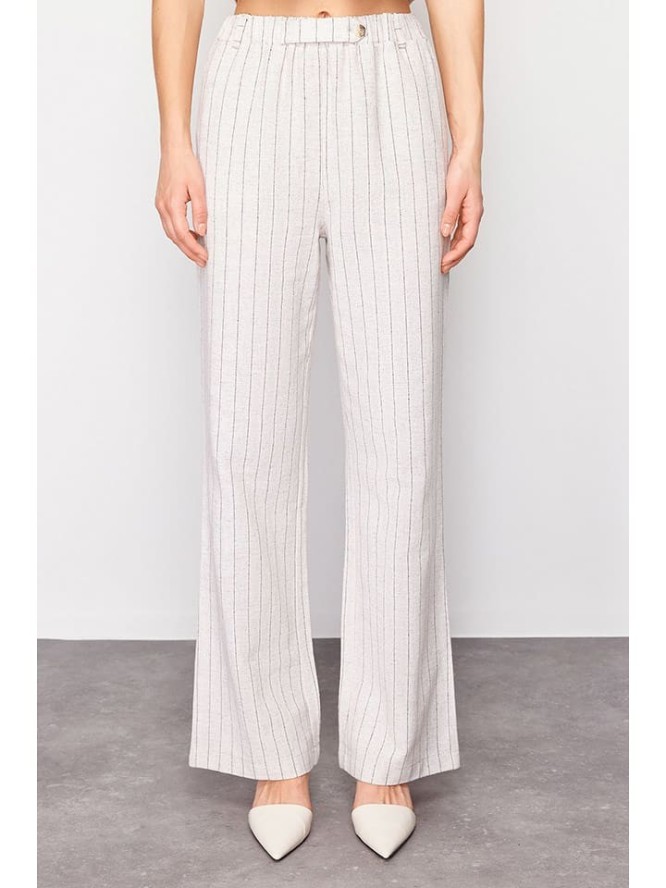 trendyol Spodnie w kolorze beżowym rozmiar: 36